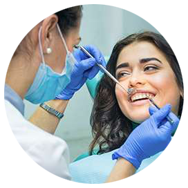 Dentist working on patient teeth